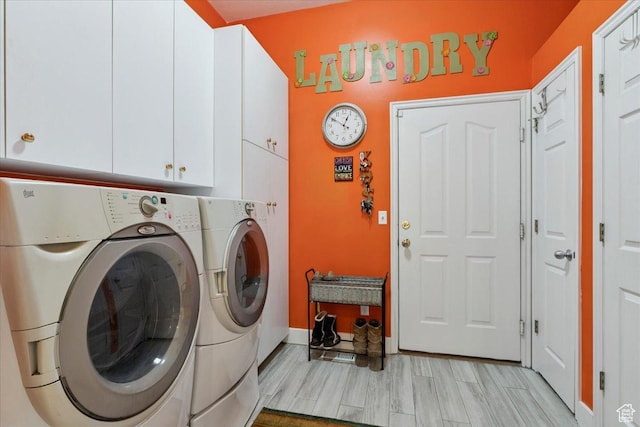 3680 N 2300 E, Layton, UT 84040 - laundry room featuring cabinet space, washer and clothes dryer, and light wood finished floors