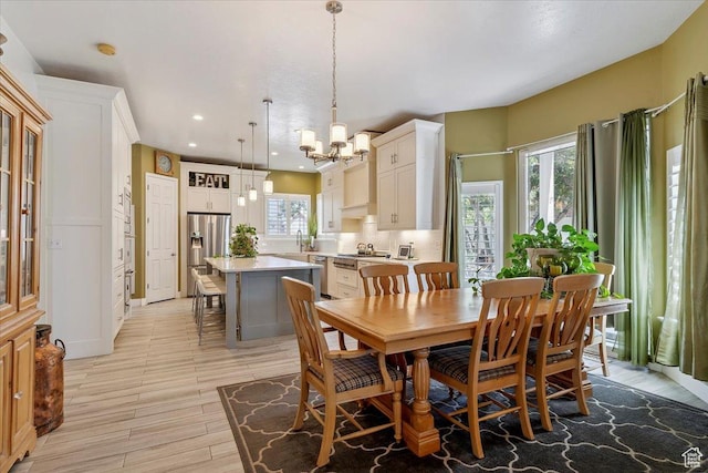 3680 N 2300 E, Layton, UT 84040 - dining area featuring a chandelier, light wood-style flooring, and recessed lighting