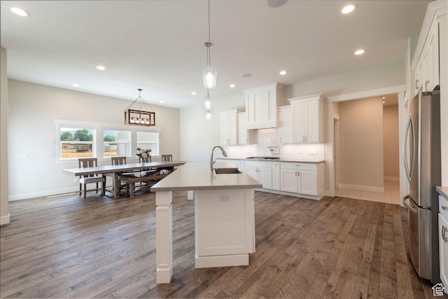 1233 S 2240 E, Heber City, UT 84032 - kitchen featuring freestanding refrigerator, backsplash, wood finished floors, white cabinetry, and recessed lighting