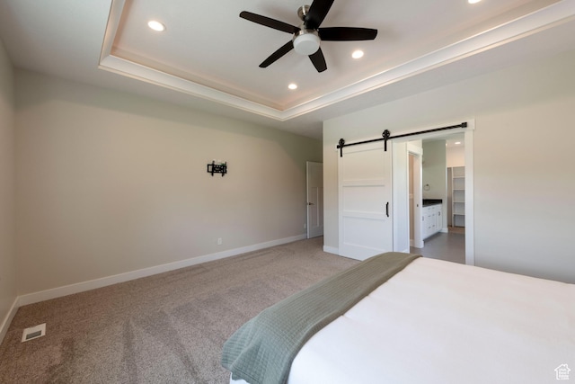 1233 S 2240 E, Heber City, UT 84032 - bedroom with a barn door, recessed lighting, a walk in closet, light colored carpet, and a tray ceiling