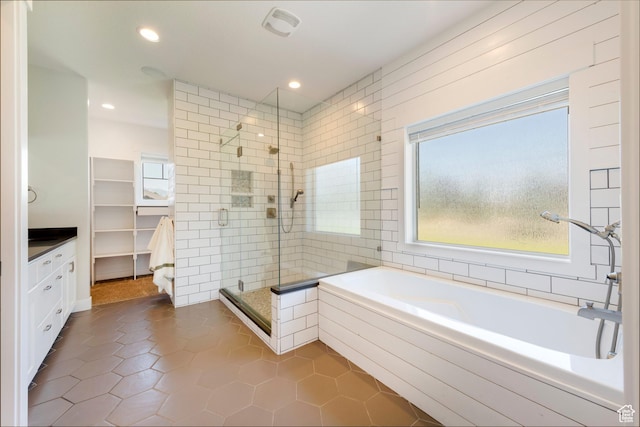 1233 S 2240 E, Heber City, UT 84032 - full bathroom featuring a stall shower, a bath, tile patterned floors, recessed lighting, and vanity