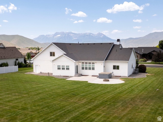 1233 S 2240 E, Heber City, UT 84032 - back of house featuring a patio, a mountain view, a chimney, and a shingled roof