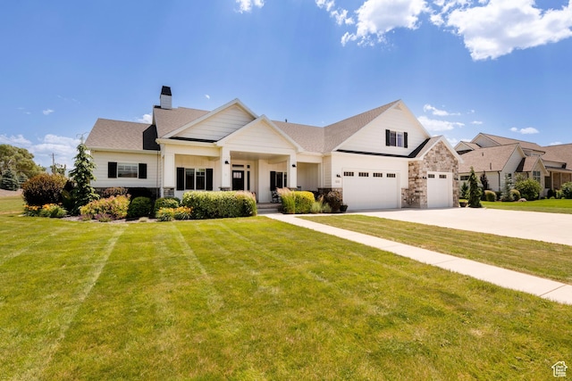 1233 S 2240 E, Heber City, UT 84032 - view of front of house featuring driveway, a chimney, a front lawn, and a garage