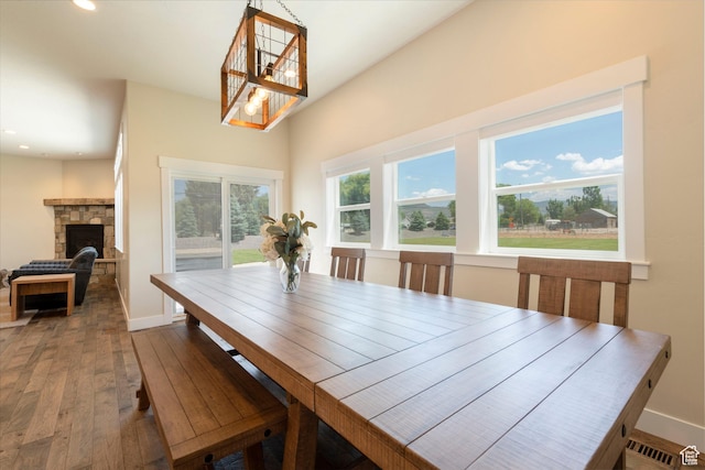 1233 S 2240 E, Heber City, UT 84032 - dining space featuring hardwood / wood-style flooring, recessed lighting, and a stone fireplace