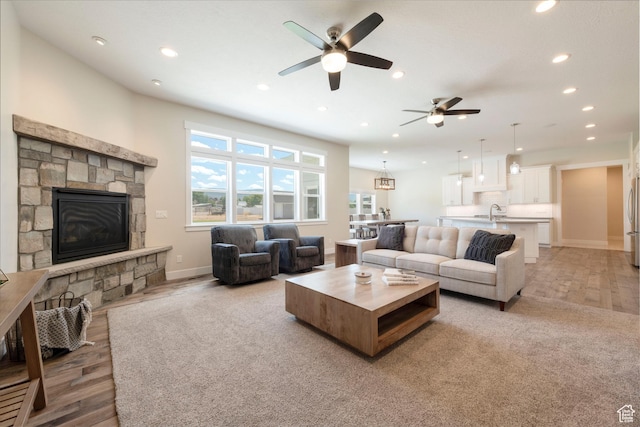 1233 S 2240 E, Heber City, UT 84032 - living room with ceiling fan, recessed lighting, light wood-type flooring, and a fireplace