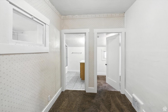 90 W 200 S, Logan, UT 84321 - corridor featuring wallpapered walls, carpet, and tile patterned flooring