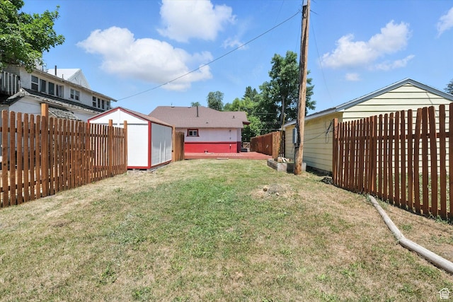 90 W 200 S, Logan, UT 84321 - fenced backyard featuring a storage unit