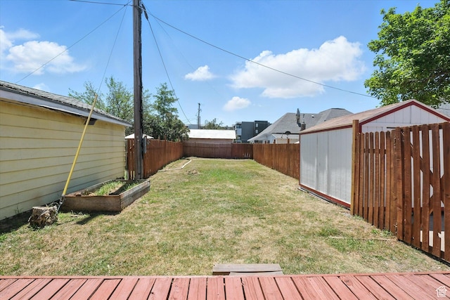 90 W 200 S, Logan, UT 84321 - fenced backyard featuring a vegetable garden