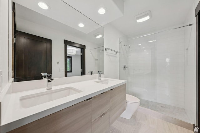 4670 Nelson Ct, Park City, UT 84098 - full bathroom with double vanity, a tile shower, and recessed lighting