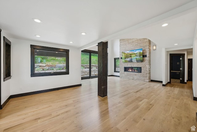 4670 Nelson Ct, Park City, UT 84098 - unfurnished living room featuring a fireplace, light wood finished floors, and recessed lighting