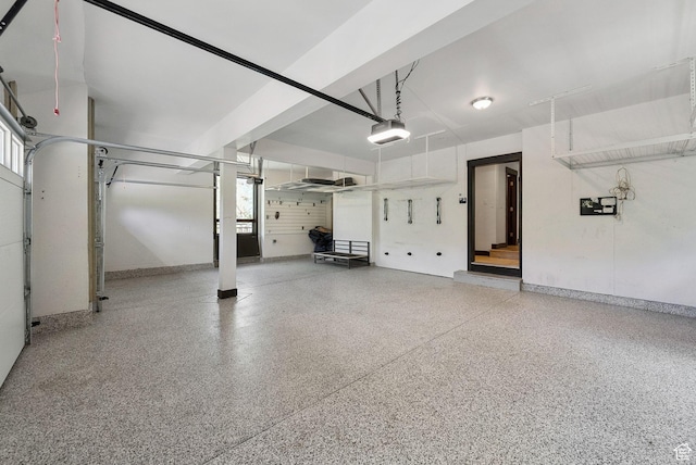 4670 Nelson Ct, Park City, UT 84098 - garage with a garage door opener and baseboards