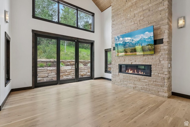 4670 Nelson Ct, Park City, UT 84098 - unfurnished living room with a fireplace, high vaulted ceiling, wood finished floors, and wooden ceiling