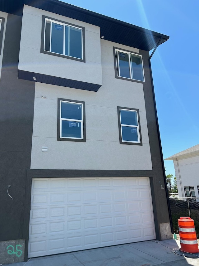66 E 750 S Unit 23, Springville, UT 84663 - view of front facade with an attached garage and driveway