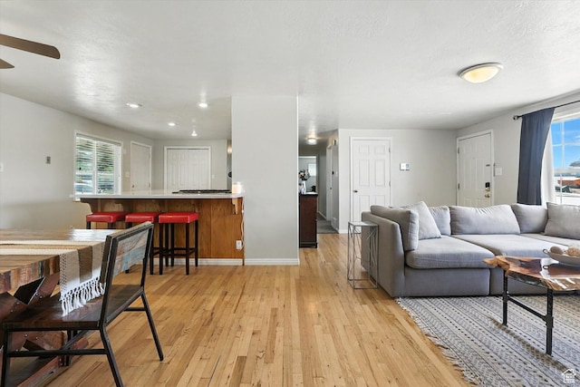 318 W 1300 N, Sunset, UT 84015 - living room featuring light wood-style floors, ceiling fan, and recessed lighting