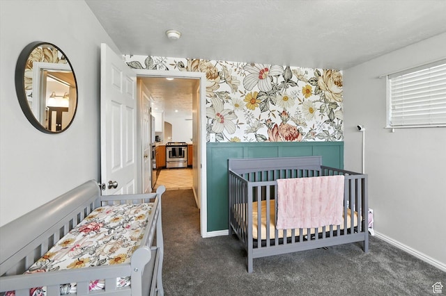 318 W 1300 N, Sunset, UT 84015 - carpeted bedroom with a crib and baseboards