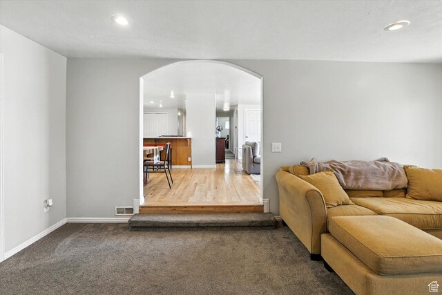 318 W 1300 N, Sunset, UT 84015 - carpeted living area with arched walkways and recessed lighting
