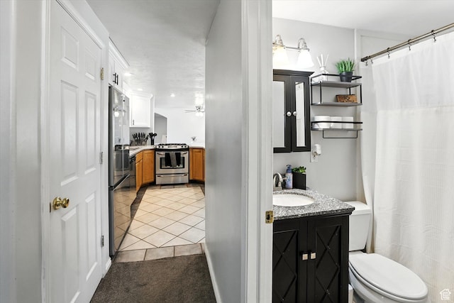 318 W 1300 N, Sunset, UT 84015 - bathroom with vanity, tile patterned flooring, and curtained shower