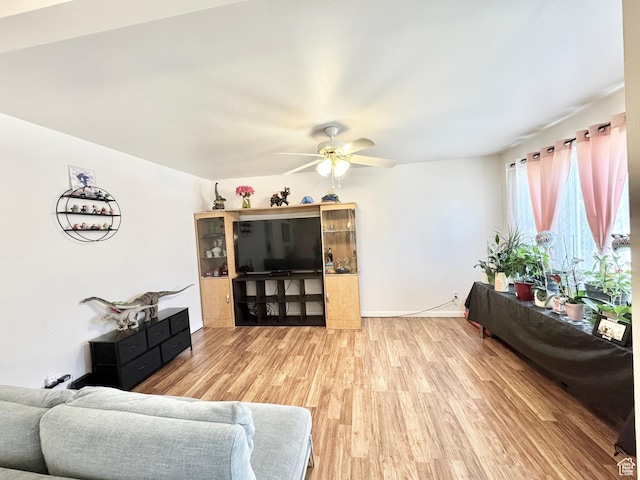 4606 W 5540 S, Kearns, UT 84118 - living area with light wood-style flooring and ceiling fan