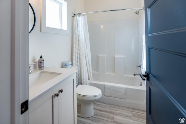 373 W Rendezvous Way N, Garden City, UT 84028 - full bath with vanity, shower / bathtub combination with curtain, and wood finished floors