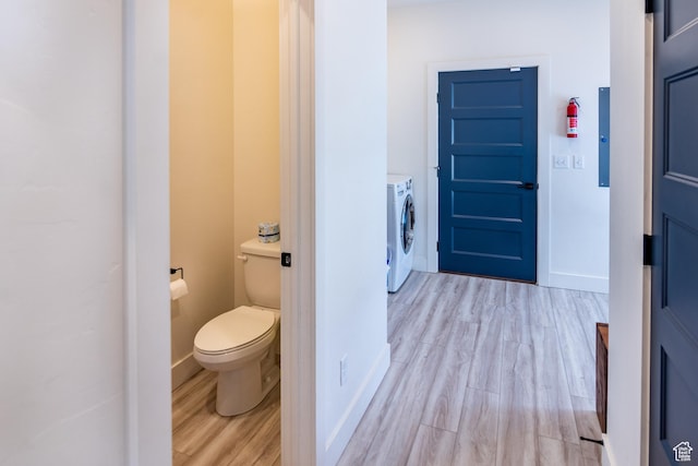 373 W Rendezvous Way N, Garden City, UT 84028 - bathroom featuring washer and dryer, wood finished floors, and electric panel