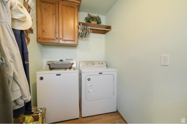 4178 E 5000 S, Vernal, UT 84078 - laundry room featuring cabinet space, separate washer and dryer, and wood finished floors