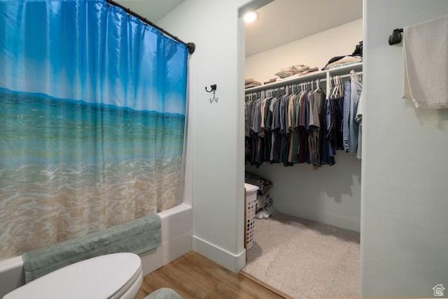 4178 E 5000 S, Vernal, UT 84078 - bathroom with shower / tub combo, wood finished floors, and a walk in closet