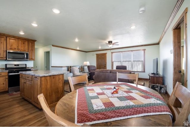 4178 E 5000 S, Vernal, UT 84078 - dining space with crown molding, dark wood finished floors, ceiling fan, and recessed lighting
