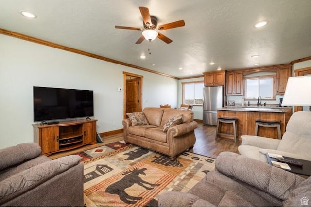 4178 E 5000 S, Vernal, UT 84078 - living room with a ceiling fan, ornamental molding, wood finished floors, and recessed lighting
