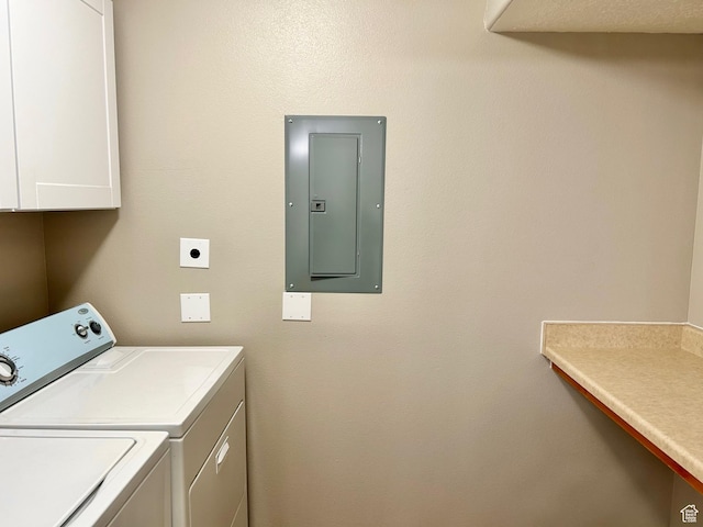 8204 N Cedar Springs Rd E Unit U-12, Eagle Mountain, UT 84005 - laundry area featuring electric panel, cabinet space, and washer and dryer