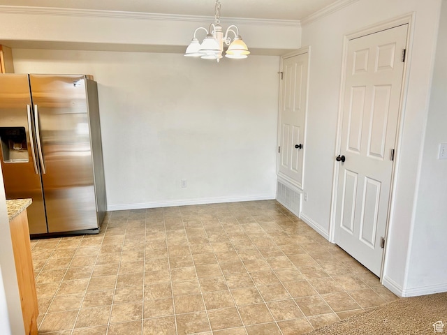 8204 N Cedar Springs Rd E Unit U-12, Eagle Mountain, UT 84005 - unfurnished dining area with a chandelier and crown molding