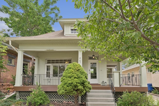 467 S 1300 E, Salt Lake City, UT 84102 - view of front of home with a porch, brick siding, and a shingled roof