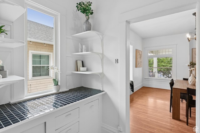 467 S 1300 E, Salt Lake City, UT 84102 - interior space with light wood-type flooring and a chandelier