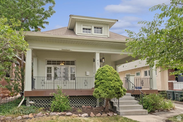 467 S 1300 E, Salt Lake City, UT 84102 - bungalow featuring a porch and a shingled roof