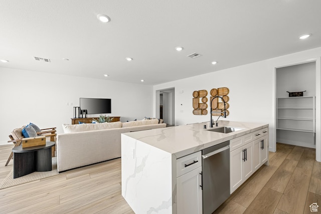 578 S Cecita Way Unit 91, St George, UT 84770 - kitchen with stainless steel dishwasher, light wood finished floors, light stone counters, white cabinetry, and recessed lighting
