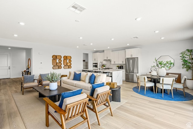 578 S Cecita Way Unit 91, St George, UT 84770 - living room featuring light wood-style flooring and recessed lighting