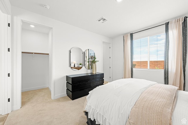 578 S Cecita Way Unit 91, St George, UT 84770 - bedroom with light carpet, a spacious closet, a closet, and recessed lighting