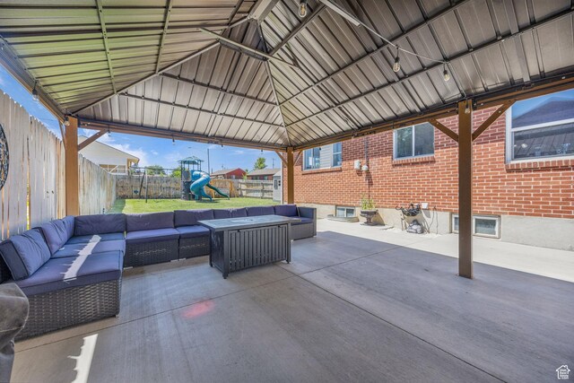 4682 S 475 W, Washington Terrace, UT 84405 - fenced backyard featuring outdoor lounge area, a playground, and a patio area