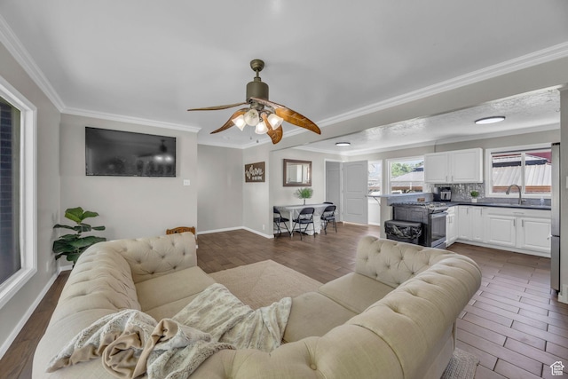 4682 S 475 W, Washington Terrace, UT 84405 - living room with crown molding, a ceiling fan, and dark wood finished floors