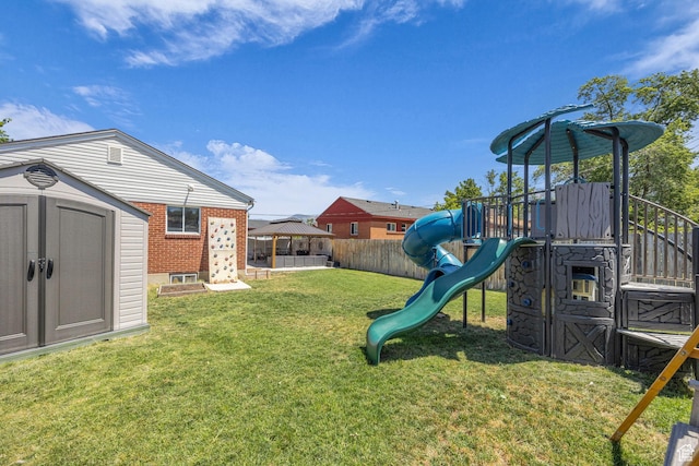 4682 S 475 W, Washington Terrace, UT 84405 - fenced backyard with a storage shed, a playground, and a gazebo
