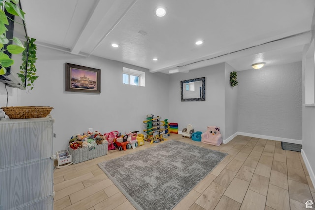 4682 S 475 W, Washington Terrace, UT 84405 - recreation room featuring light wood-type flooring, recessed lighting, and beam ceiling