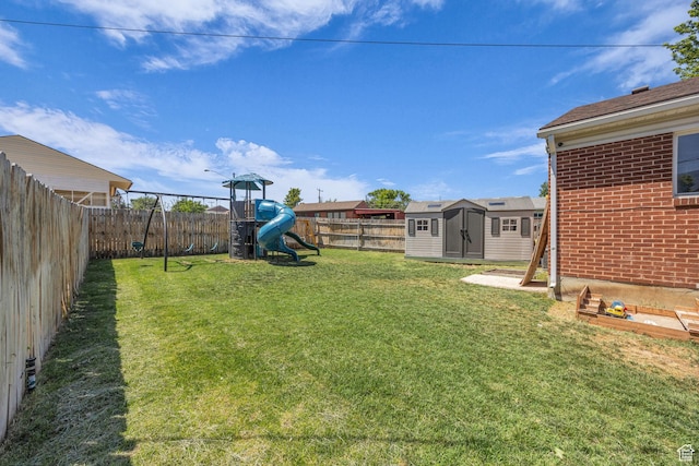 4682 S 475 W, Washington Terrace, UT 84405 - fenced backyard featuring a playground and a storage shed