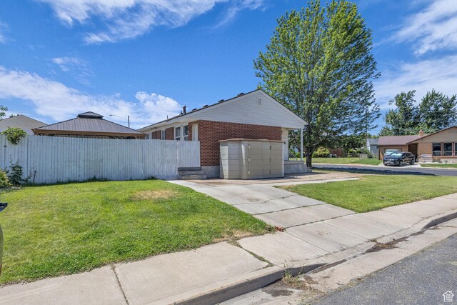 4682 S 475 W, Washington Terrace, UT 84405 - view of front of home featuring brick siding