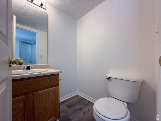 1356 S 1400 E, Provo, UT 84606 - bathroom with wood finished floors, vanity, and a textured ceiling