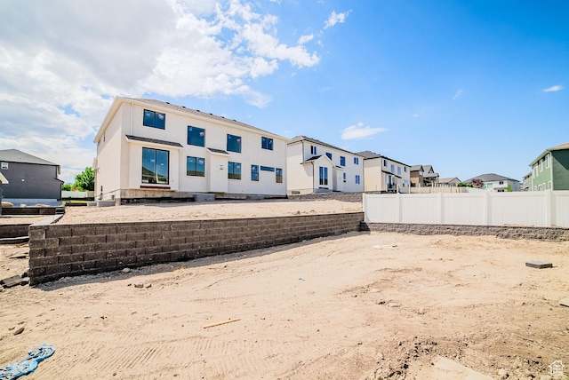 10942 S Samoa Dune Dr, South Jordan, UT 84009 - rear view of house with a residential view and stucco siding