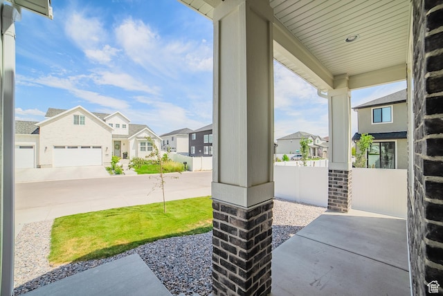 10942 S Samoa Dune Dr, South Jordan, UT 84009 - porch with a residential view and a garage