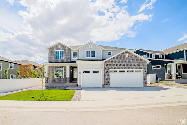 10942 S Samoa Dune Dr, South Jordan, UT 84009 - view of front of house featuring board and batten siding, concrete driveway, and an attached garage