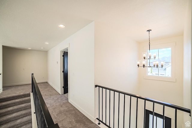 10942 S Samoa Dune Dr, South Jordan, UT 84009 - hall with a chandelier, carpet, recessed lighting, and an upstairs landing