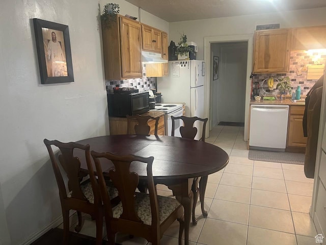 7659 S Lincoln St, Midvale, UT 84047 - dining area featuring light tile patterned floors