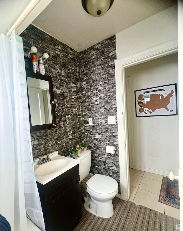 7659 S Lincoln St, Midvale, UT 84047 - bathroom featuring tile patterned floors and vanity