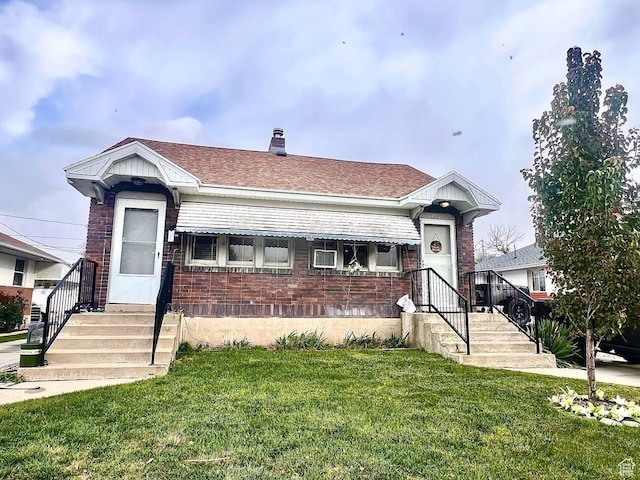 7659 S Lincoln St, Midvale, UT 84047 - view of front of house with a front lawn and brick siding